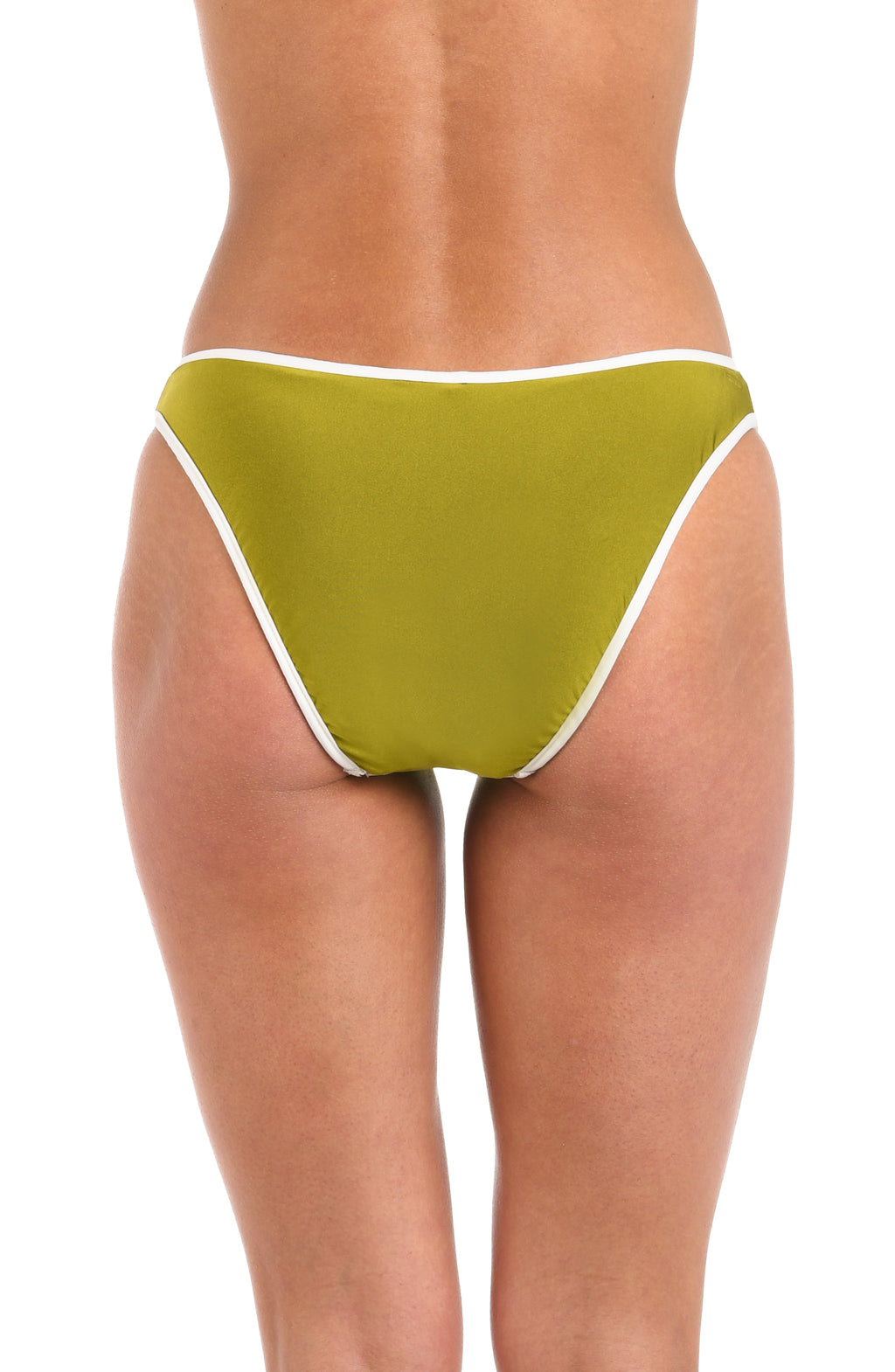 Back image of model wearing a reversible French cut bikini bottom: one side features a solid olive green color with white trim, while the other side showcases a bold black and white geometric print. 