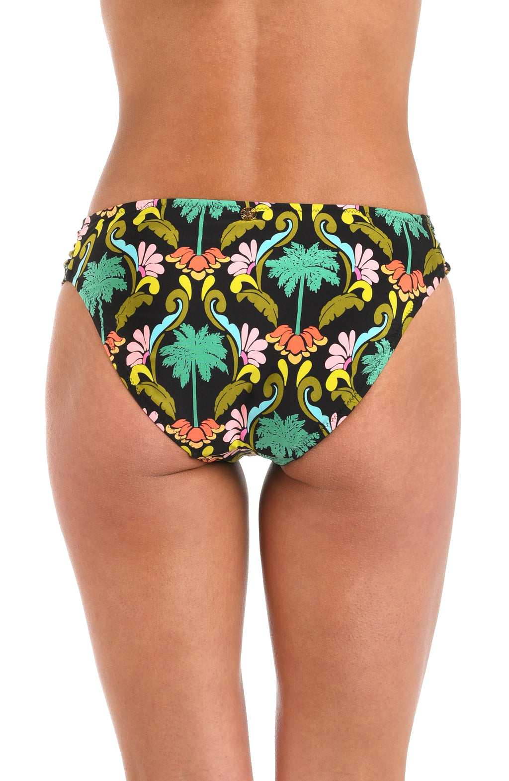 Back image of model wearing a multi-colored side shirred hipster bikini bottom with a tropical-inspired design. 