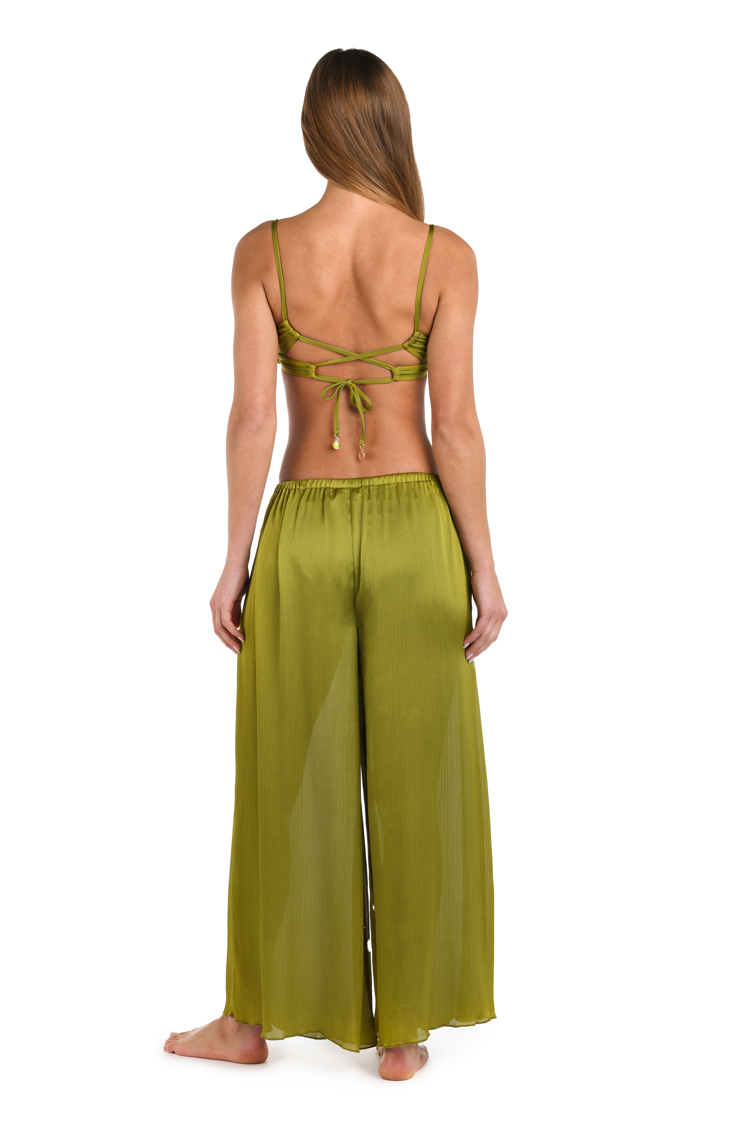 Full body back image of model wearing a solid olive crinkle pant cover up.       