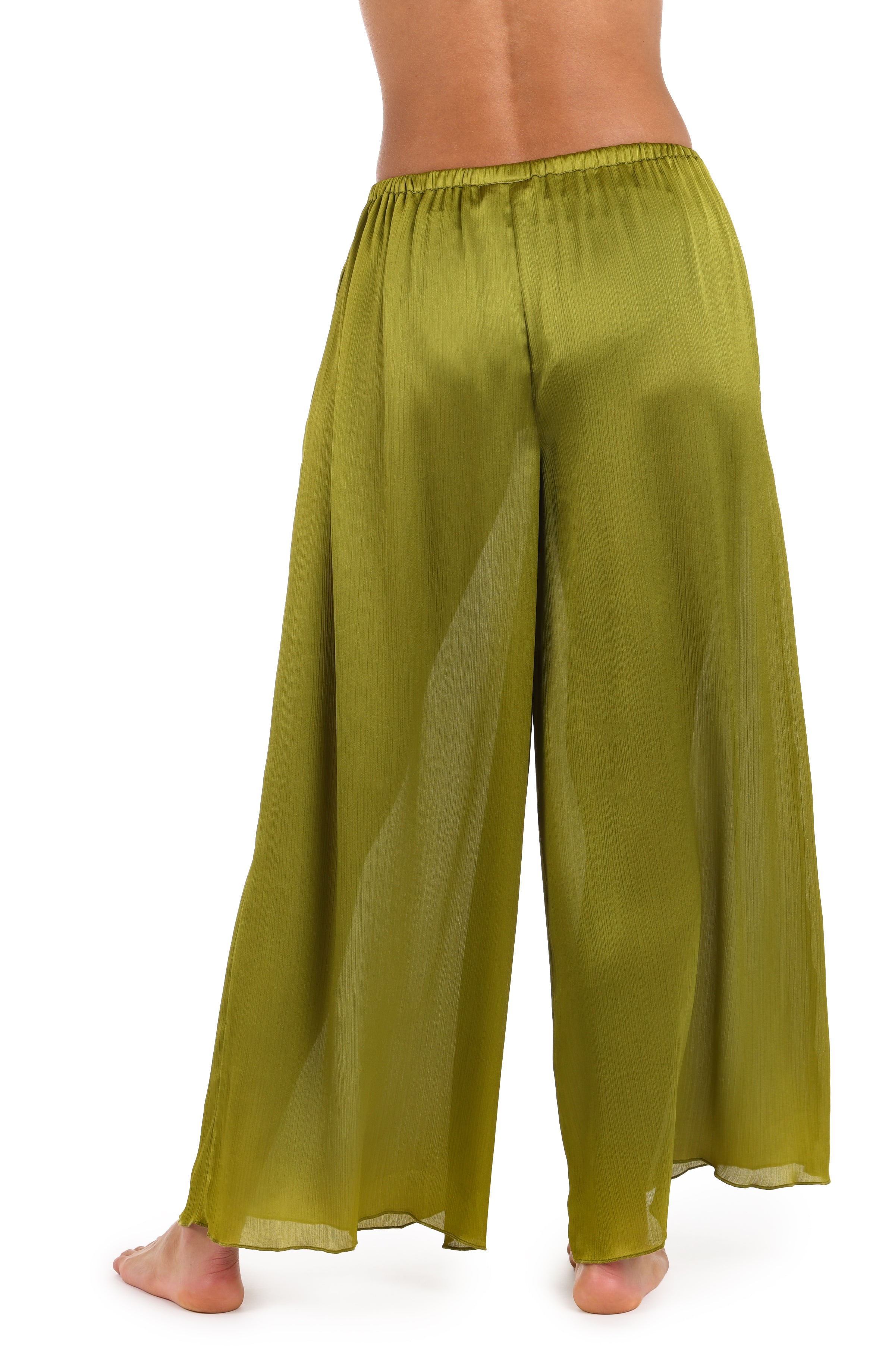 Back image of model wearing a solid olive crinkle pant cover up.       