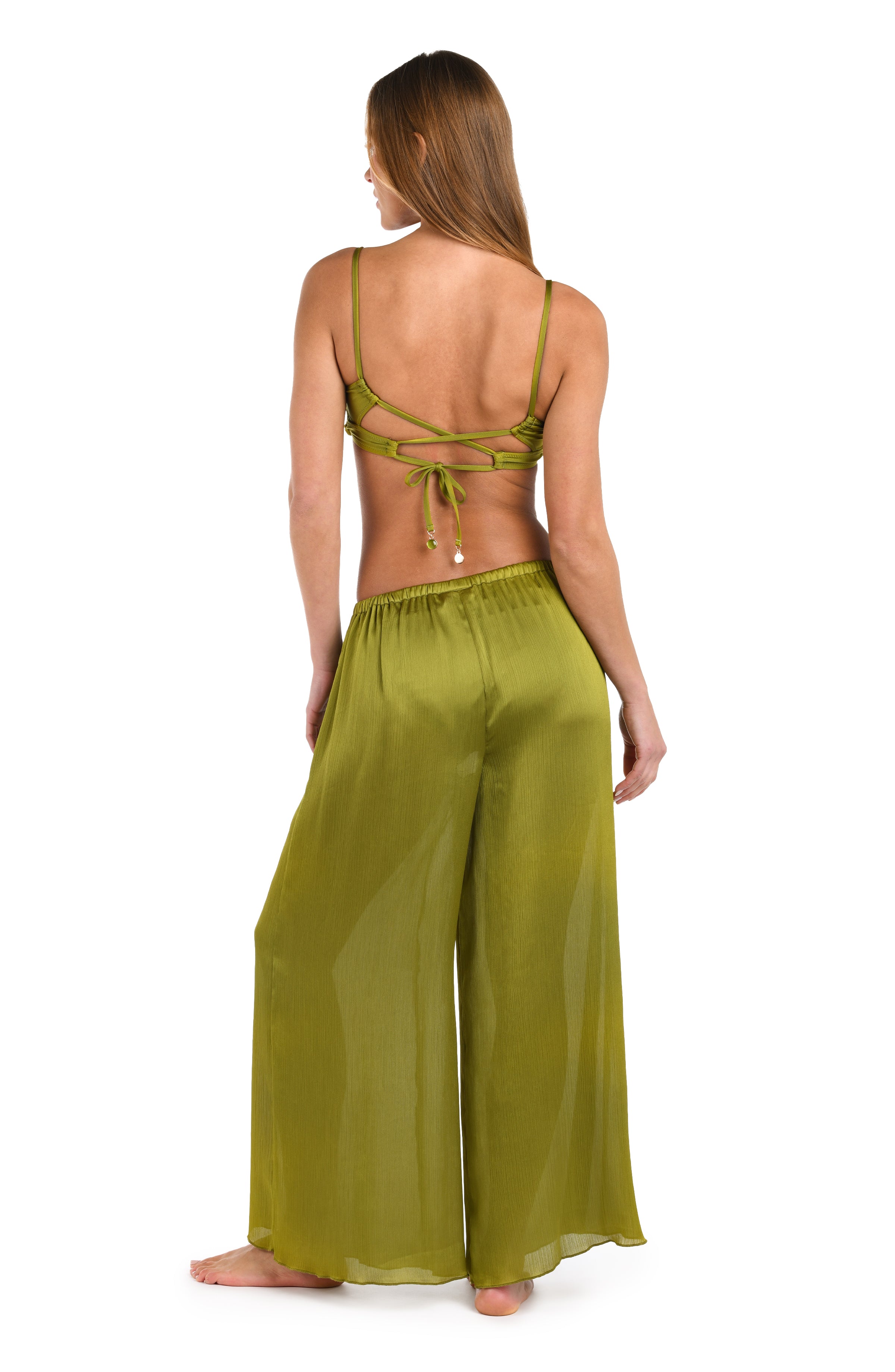 Full body back image of model wearing a solid olive crinkle pant cover up.       