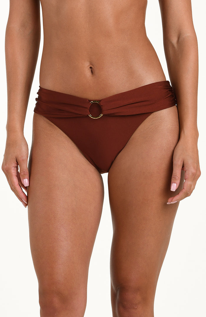 Mahogany bikini bottom with a ring detail on a white background