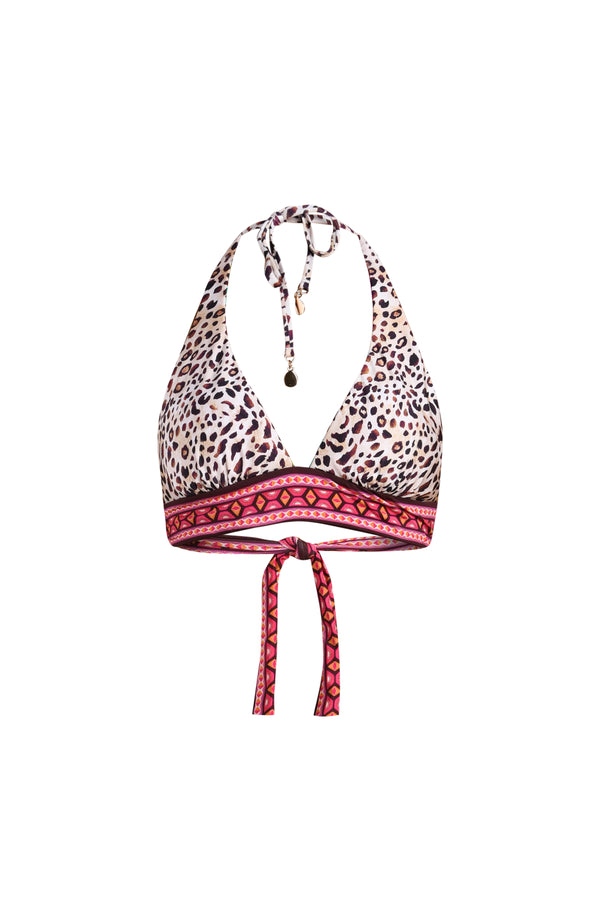 3D image of a multicolored printed reversible bikini top featuring leopard on one side and a tropical print on the other. It has adjustable halter straps, band underneath the bust, and back ties. 