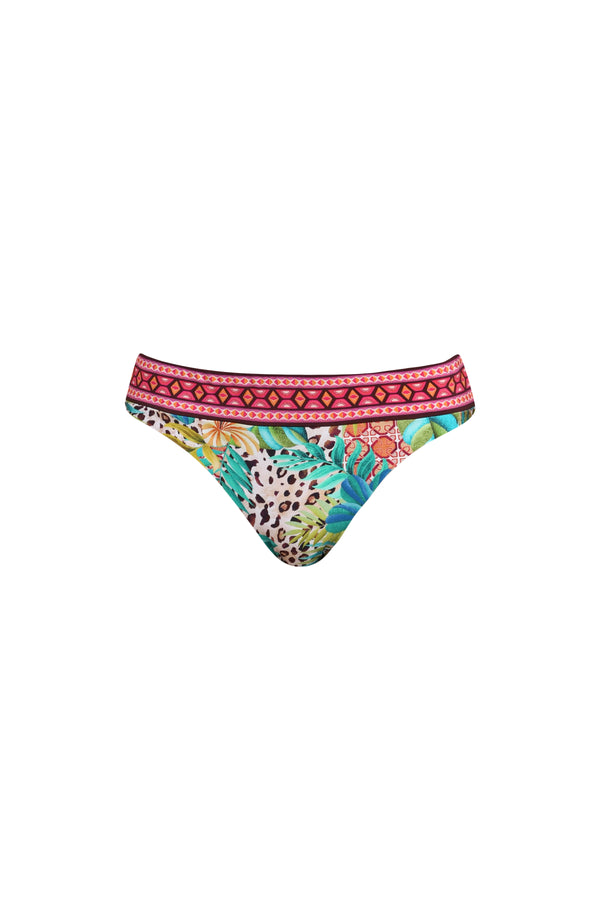 3D image of a multicolored printed reversible bikini bottom featuring leopard on one side and a tropical print on the other. It has an allover band and moderate rear coverage. 