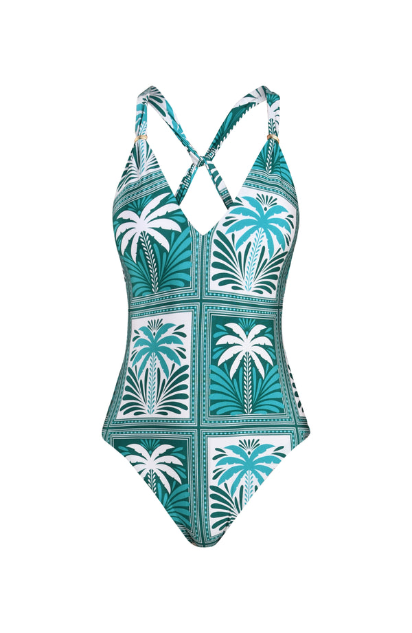 Floating image of a tropical patterned one-piece swimsuit on a white background