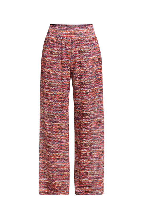 Floating image of long beach pants in a multicolored ripple pattern featuring an elastic waist. 