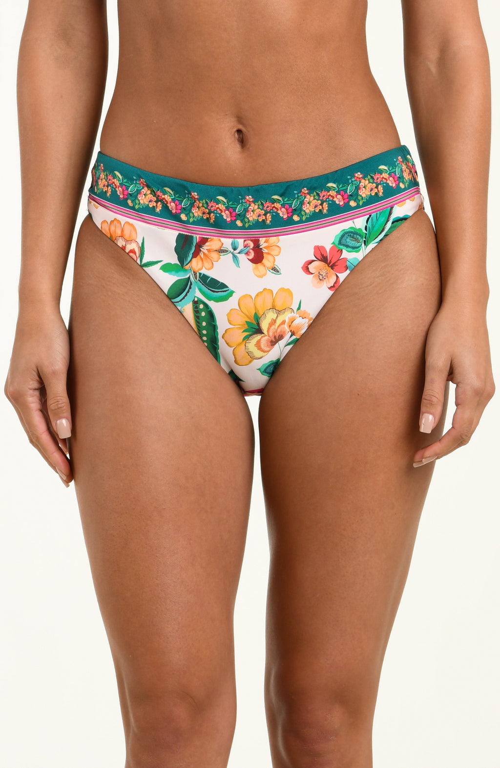 Multicolored floral-patterned bikini bottom worn by a person on a white background