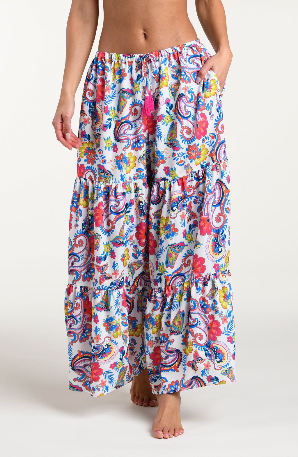Multicolored beach pants against a white background. 