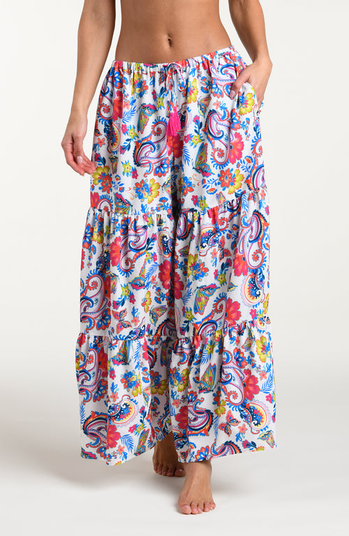 Multicolored beach pants against a white background. 