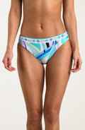 Multicolored bikini bottoms worn by a person against a white background. 