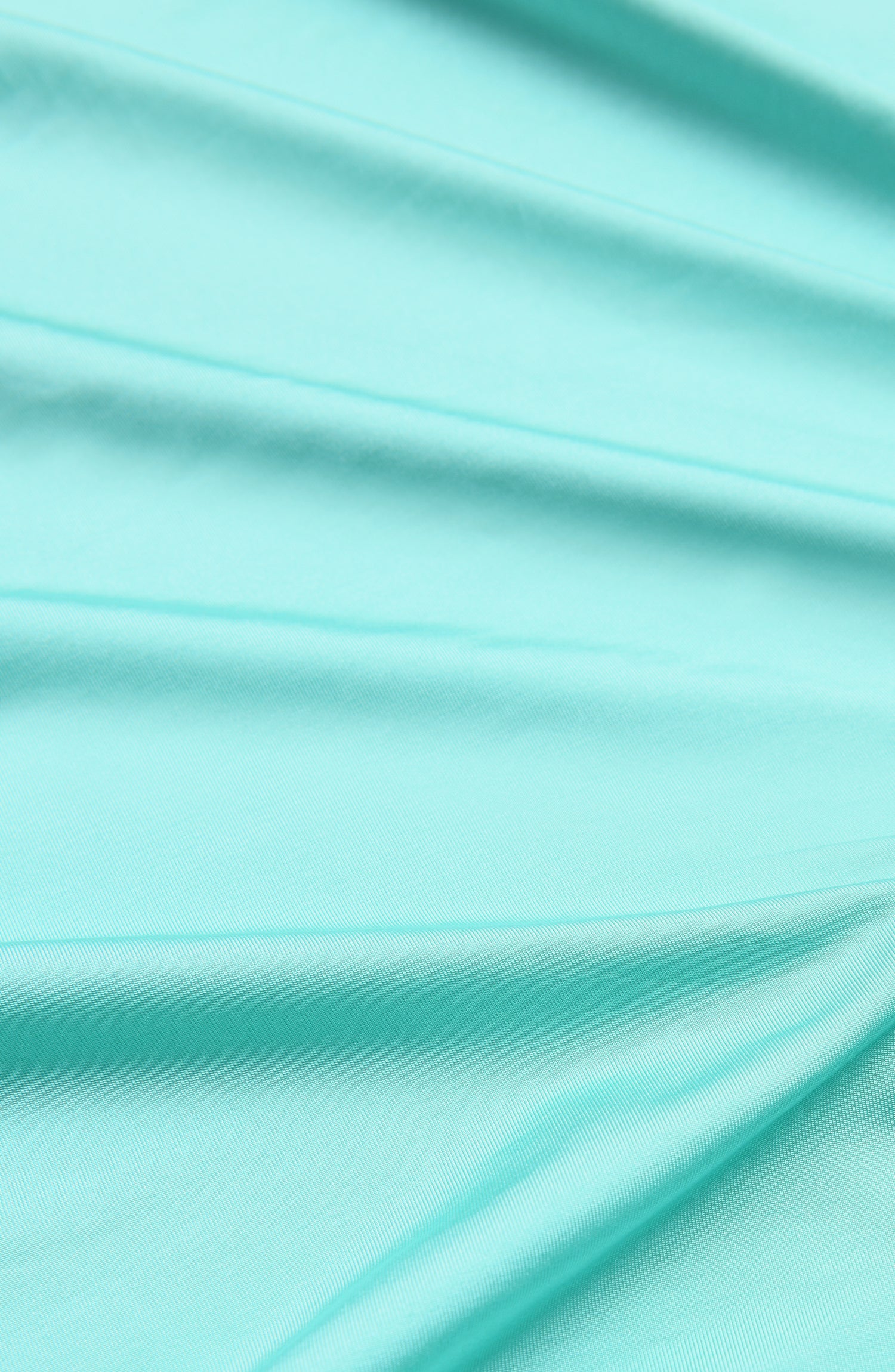 Detail image of a Sunshine 79 Sunshine Solids Pull-On Faux Pareo Cover Up in Seaglass.