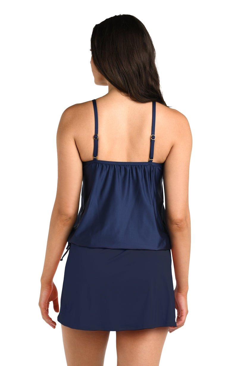 Back image of model wearing the 24th & Ocean Solid Underwire V-Neck Blouson Tankini Top in Midnight.