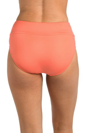 Back image of model wearing the 24th & Ocean Solid High Waist Bottom in Coral.