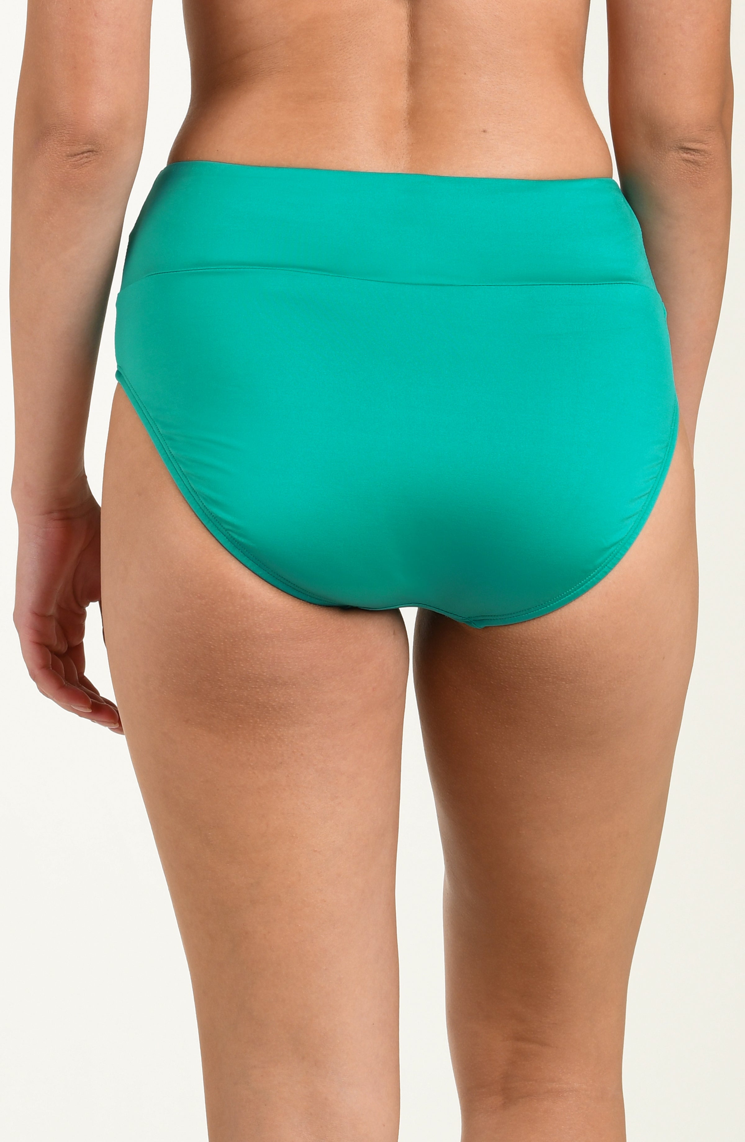 Back image of model wearing an emerald green colored high-waisted bottom with full coverage and a smooth, streamlined fit for a flattering silhouette.