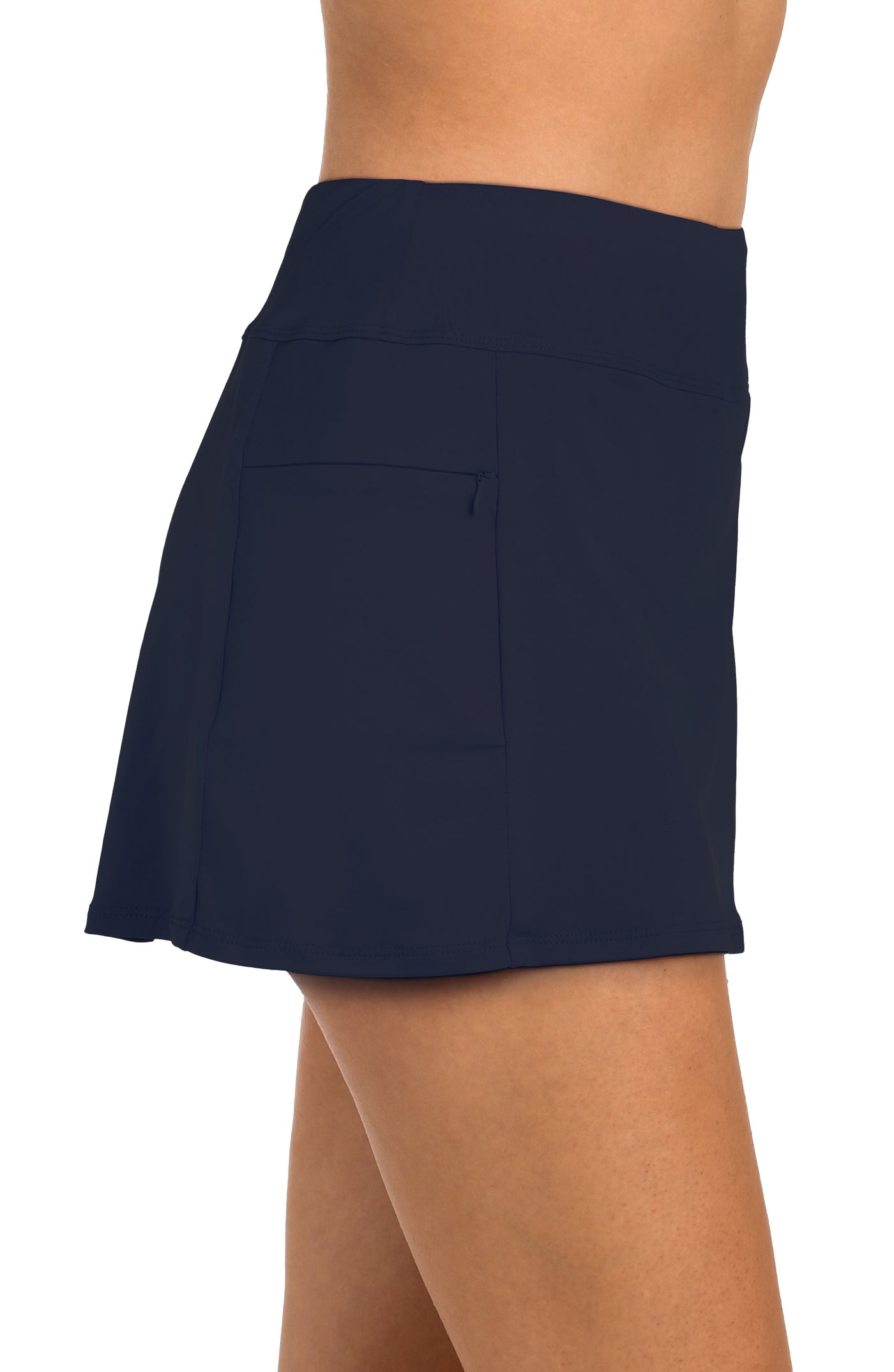 
                  
                    Side image of model wearing the 24th & Ocean Solid Swim Skort Bottom in Midnight.
                  
                