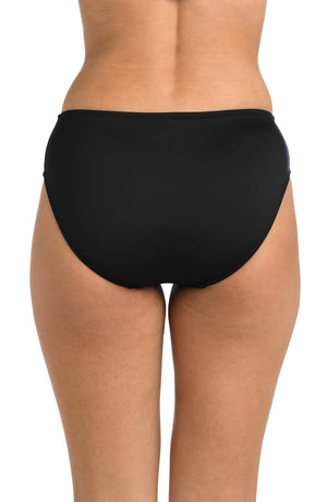 Back image of model wearing the 24th & Ocean Solid Mid Waist Bikini Bottom in Black.