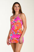 Front image of model wearing a multicolored pink floral printed tankini top features a relaxed, flowy fit with a  cutout neckline, over the shoulder adjustable straps, and underwire support. This is paired with a matching swim skort.