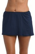 Midnight blue athletic skirt worn by a person on a white background