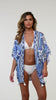 Model is wearing the Beyond the Pacific Kimono Cover Up.