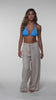 Model is wearing a Delphine Coast Palazzo Pant Swimsuit Cover Up