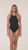 Model is wearing the Island Goddess High Neck One Piece in Black.