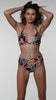 Model is wearing a multicolored Halter Bikini Swimsuit Top