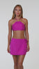 Video of model wearing a Sunshine 79 Sunshine Solids High Neck Top in Bright Violet.