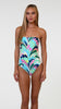 Model is wearing a white, blue, green, and pink multicolored floral printed Bandeau One Piece