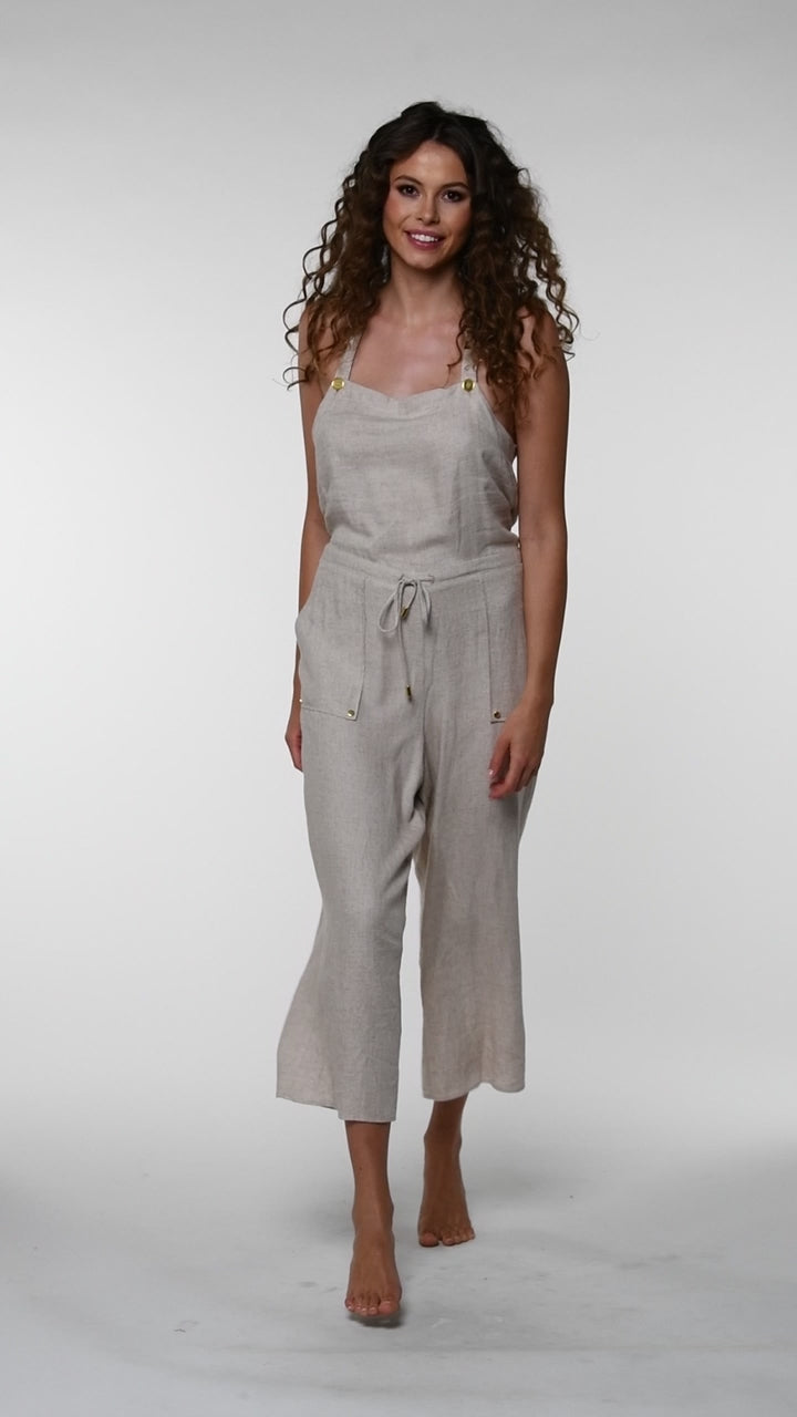 Model is wearing a Delphine Coast Jumpsuit Cover Up