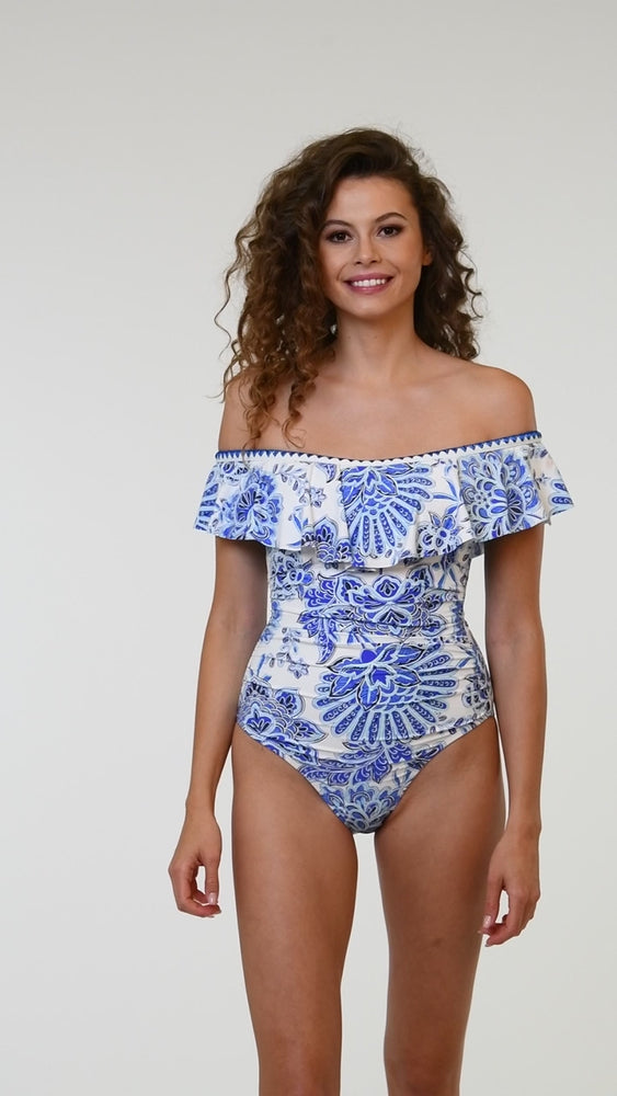 
            
                Load and play video in Gallery viewer, Model is wearing the La Blanca Beyond the Pacific Off Shoulder Ruffle One Piece.
            
        