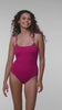 Model is wearing a Saltwater Sands Magenta Lingerie One Piece Swimsuit