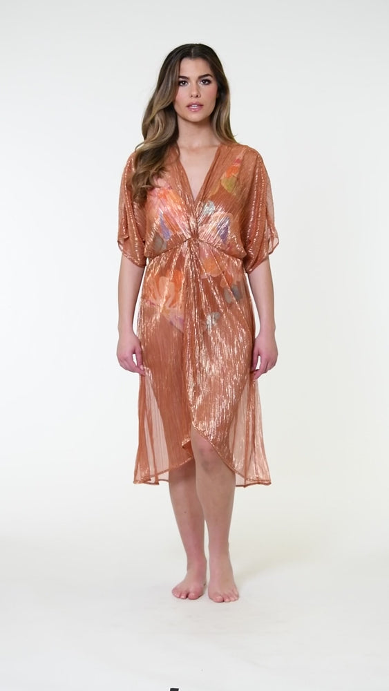 
                  
                    Load and play video in Gallery viewer, Model is wearing a shimmering orange and pink short sleeve midi dress cover up.
                  
                