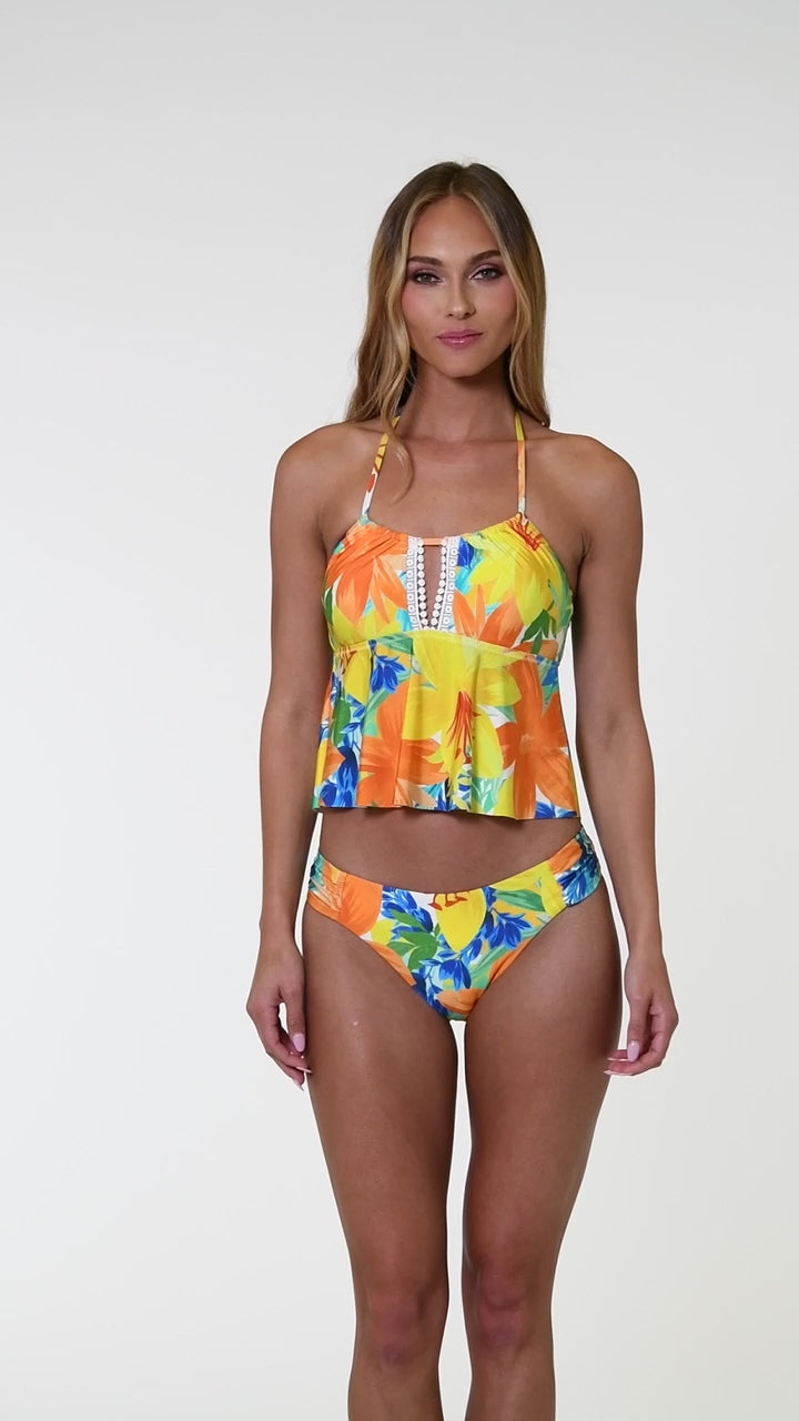 
                  
                    Load and play video in Gallery viewer, Model is wearing a blue, green, and orange multi colored floral printed flounce midkini swimsuit top.
                  
                