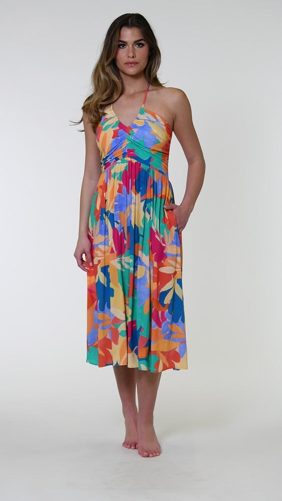 
                  
                    Load and play video in Gallery viewer, Model is wearing an orange, pink, blue, and aqua multicolored tropical patterned halter midi dress cover up.
                  
                