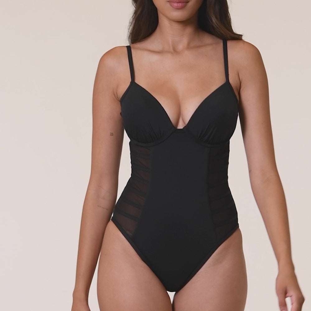 
                  
                    Load and play video in Gallery viewer, Model is wearing the Island Goddess Underwire Mesh One Piece in Black.
                  
                