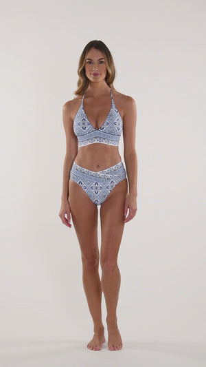 
            
                Load and play video in Gallery viewer, This is a video of a Model is wearing a light blue artful mosaic printed halter triangle swimsuit top from our Mediterranean Breeze collection.
            
        