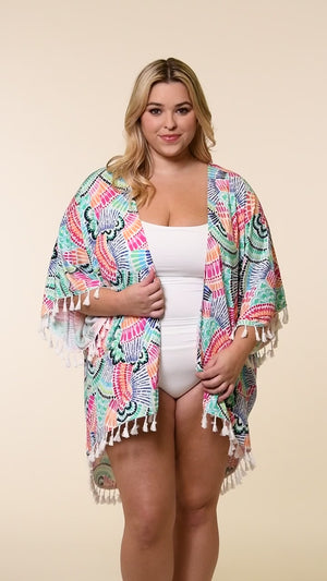 
            
                Load and play video in Gallery viewer, This is a video of a Model is wearing a multi colored geometric printed kimono cover up from our Waves of Color collection!
            
        