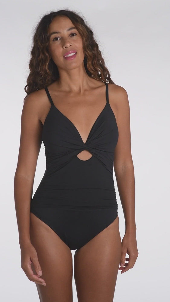 
            
                Load and play video in Gallery viewer, This is a video of a model wearing a black one piece swimsuit from our Best-Selling Island Goddess collection.
            
        