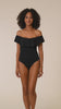 This is a video of a Model is wearing a black one piece swimsuit from our Best-Selling Island Goddess collection.