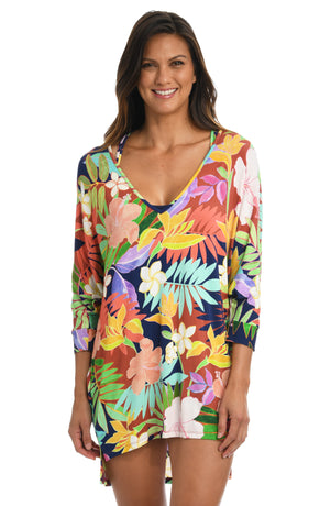 
            
                Load image into Gallery viewer, Model is wearing a multi-colored tropical v-neck tunic swimsuit cover up from our In The Tropics collection!
            
        