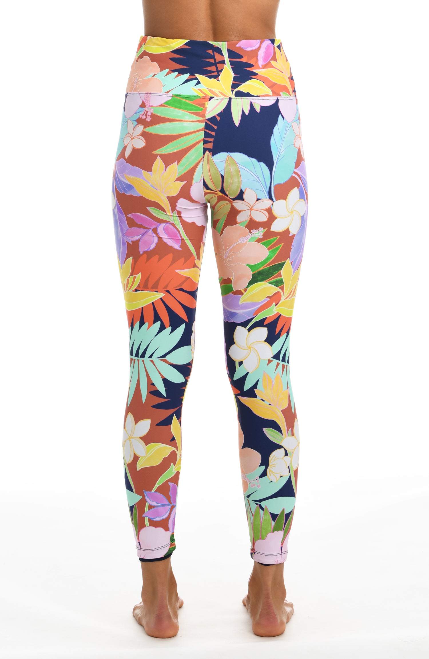 Model is wearing a multi-colored tropical high waist legging from our In The Tropics collection!