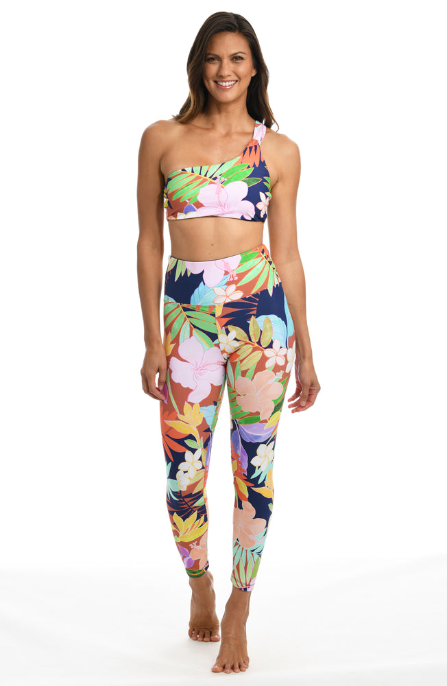 Model is wearing a multi-colored tropical high waist legging from our In The Tropics collection!