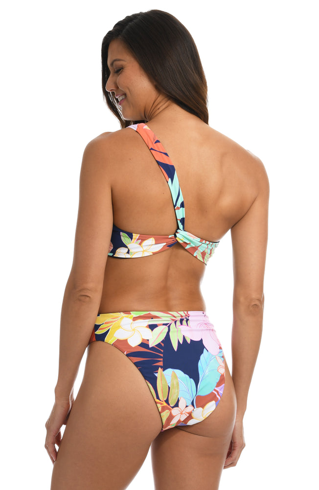 Model is wearing a multi-colored tropical swimsuit top from our In The Tropics collection!