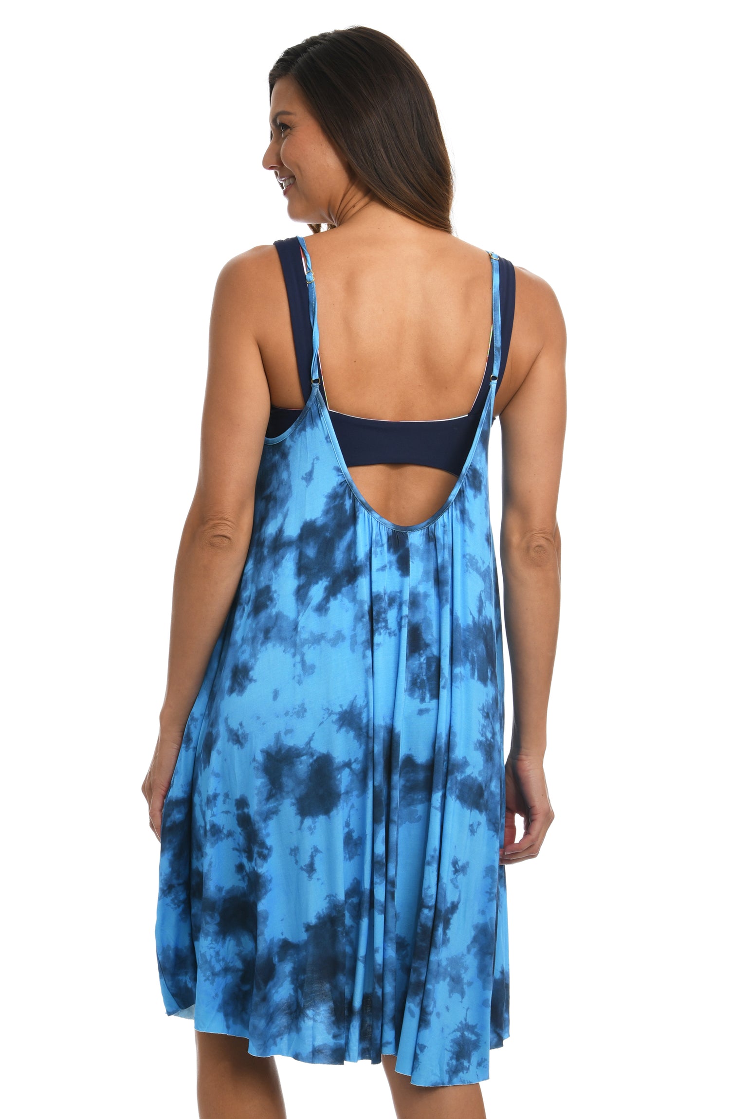Model is wearing a blue dreamy cloud-inspired printed trapeze dress swimsuit cover up from our Head in the Clouds collection.