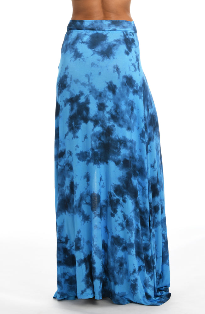 
            
                Load image into Gallery viewer, Model is wearing a blue dreamy cloud-inspired printed maxi skirt swimsuit cover up from our Head in the Clouds collection.
            
        