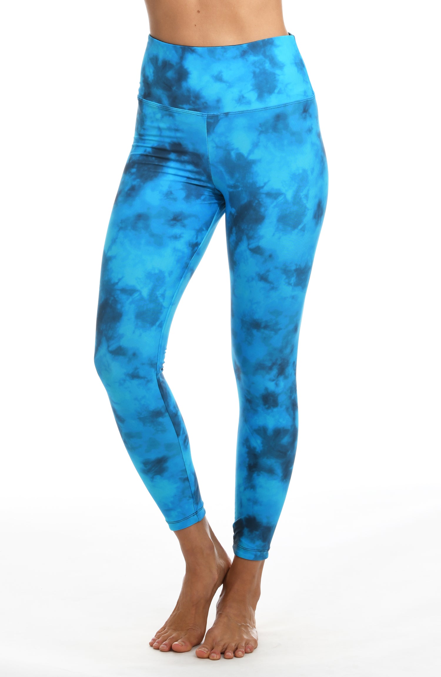 Model is wearing a blue dreamy cloud-inspired printed high waist legging from our Head in the Clouds collection.