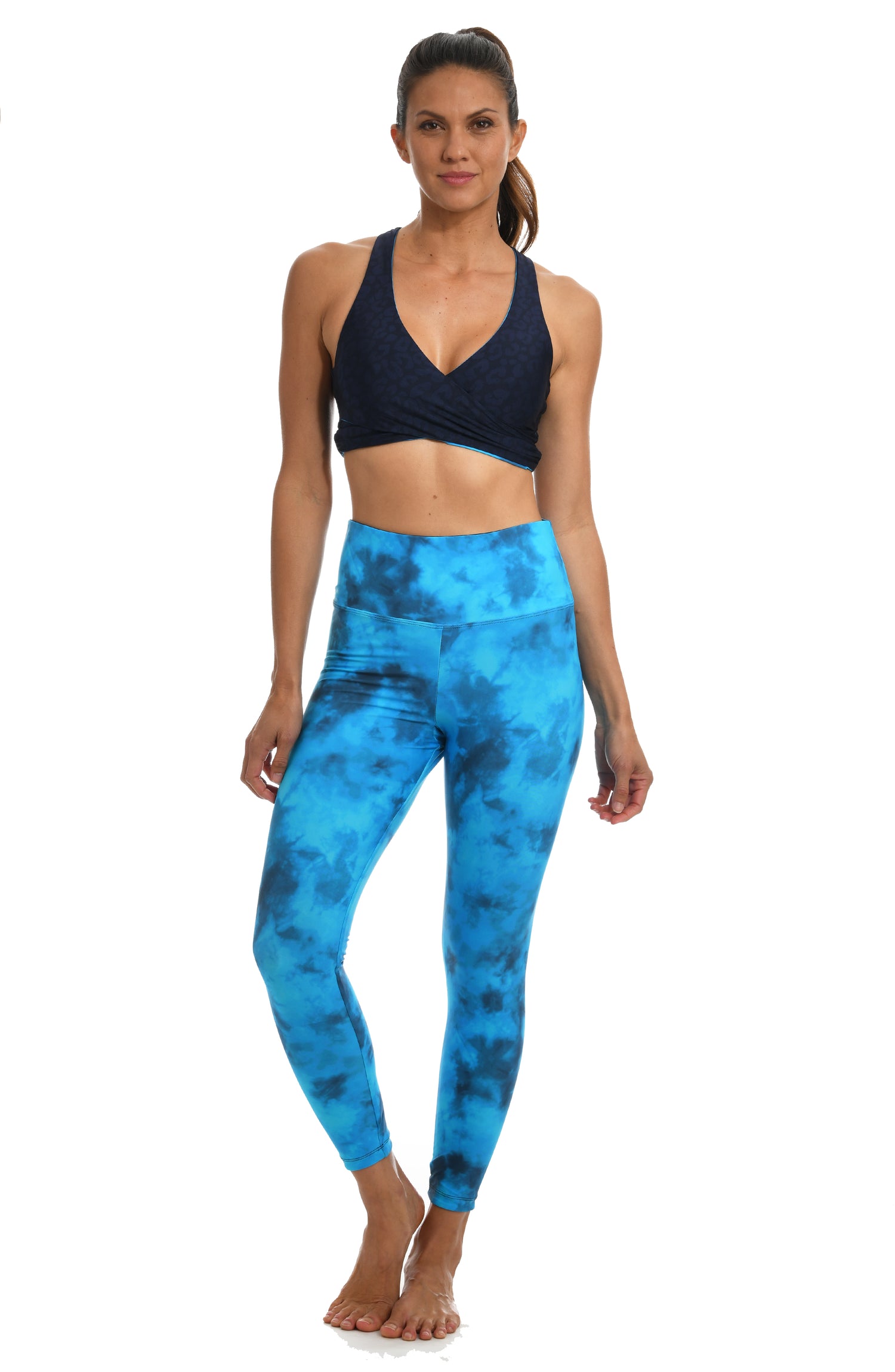 Model is wearing a blue dreamy cloud-inspired printed high waist legging from our Head in the Clouds collection.