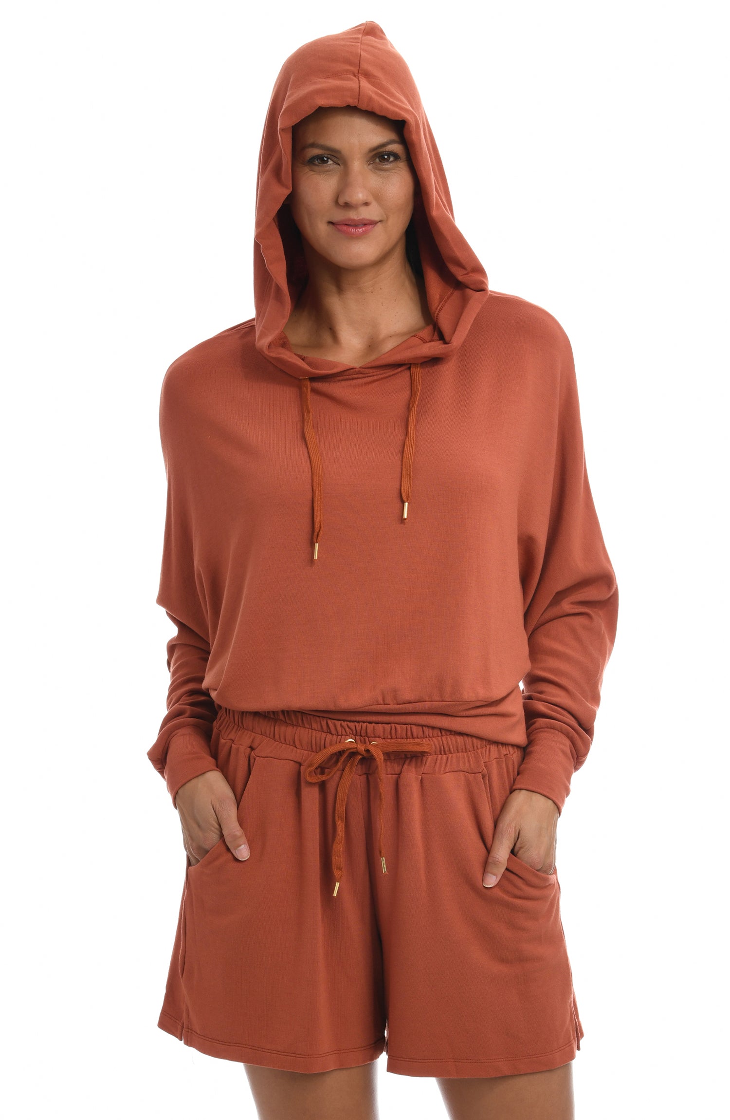 Model is wearing a clay colored french hooded sweat shirt from our Cozy Knit collection!