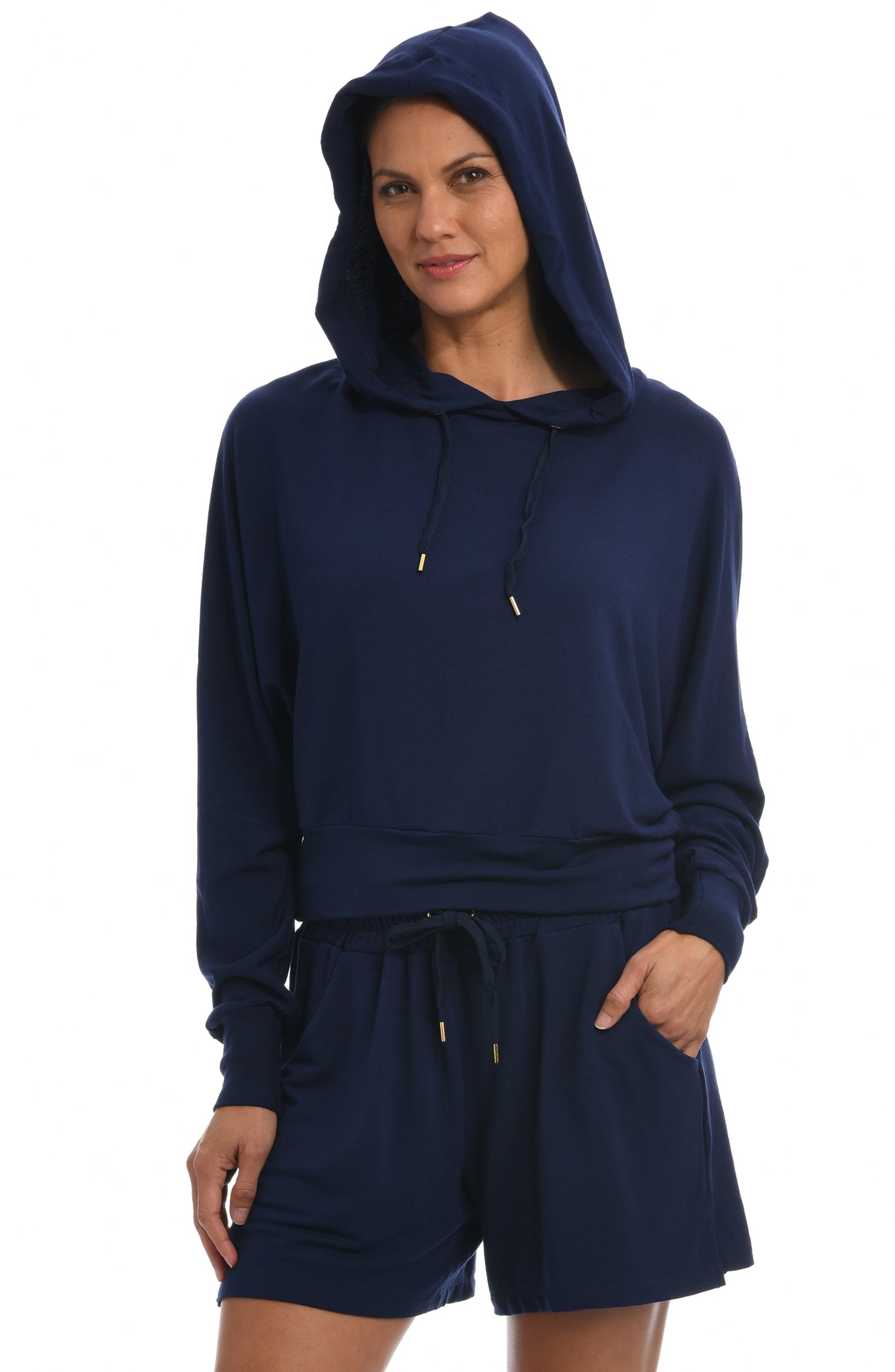 Model is wearing a midnight colored french terry hoodie from our Cozy Knit collection!