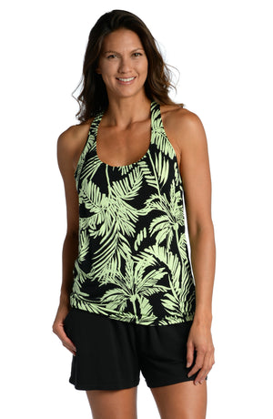 Model is wearing a green and black colored tropical printed tank top from our Abstract Palm collection!